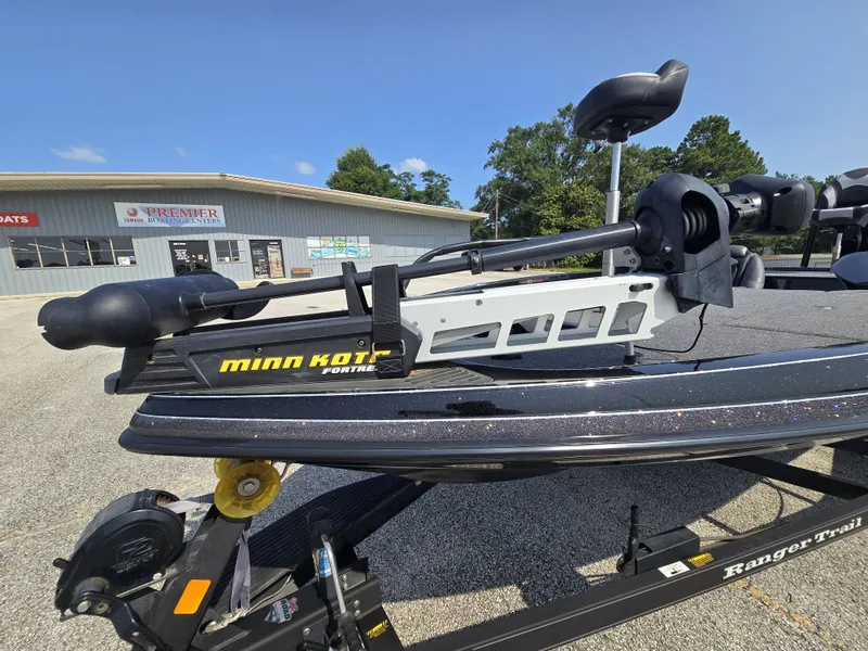 Slide: The Image of A 2018 Ranger Z521 Comanche with Minn Kota trolling motor, parked on a trailer. - 9