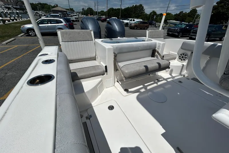 Slide: The Image of 2018 Sea Fox 266 Commander boat interior with seating and cup holders. - 12