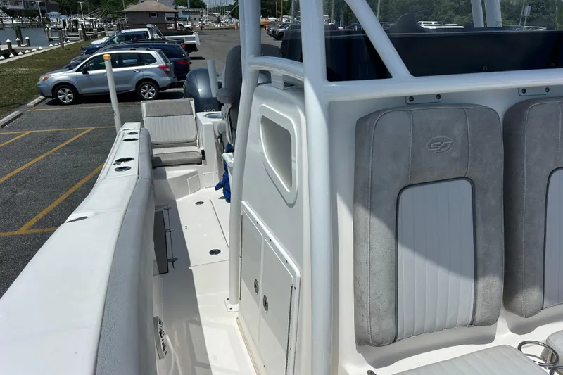Slide: The Image of 2018 Sea Fox 266 Commander boat interior with seating and storage compartments. - 27