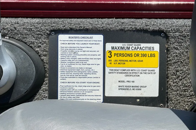 Slide: The Image of 2019 Tracker Pro 160 boat capacity label, showing maximum of 3 persons or 390 lbs. - 27