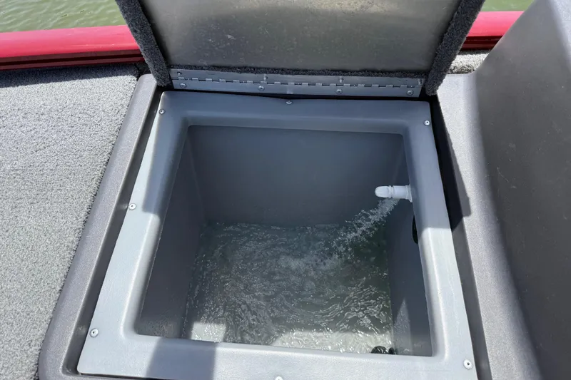 Slide: The Image of Livewell in 2019 Tracker Pro 160 boat, water filling through a pipe. - 32