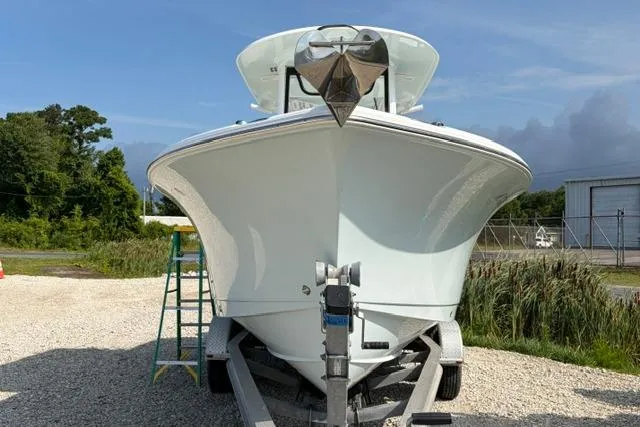 Slide: The Image of 2018 Sea Hunt Ultra 255 SE boat on trailer, front view, outdoors. - 3