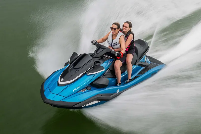 Slide: The Image of Manufacturer Provided Image: Two people riding a 2026 Yamaha WaveRunner FX Cruiser SVHO on water. - 2