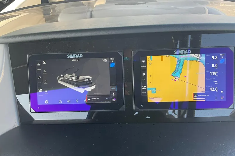 Slide: The Image of Simrad navigation screens on 2025 Harris Solstice 250 SLEC boat dashboard. - 15