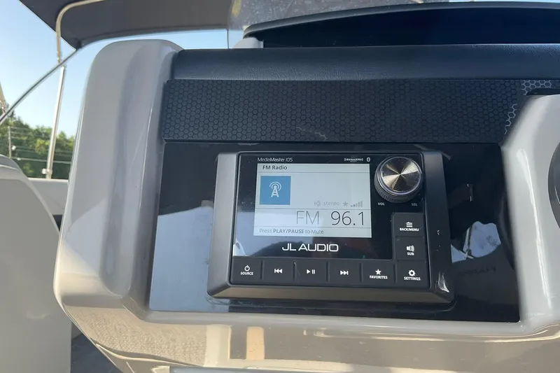 Slide: The Image of JL Audio system on 2025 Harris Solstice 250 SLEC displaying FM 96.1. - 18