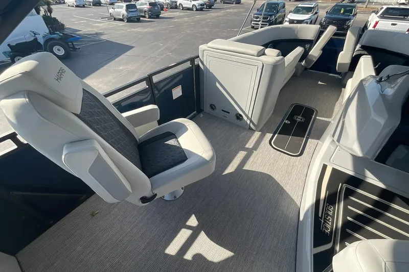 Slide: The Image of Luxurious interior of 2025 Harris Solstice 250 SLEC pontoon boat with plush seating. - 33