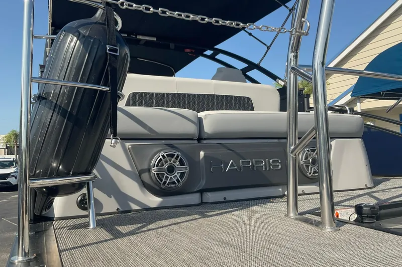 Slide: The Image of 2025 Harris Solstice 250 SLEC pontoon boat with sleek seating and modern design. - 37