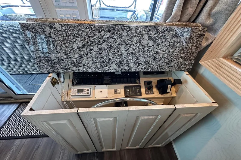 Slide: The Image of Hidden boat control panel with granite top, Fantasy 18x82, 2001 model. - 3