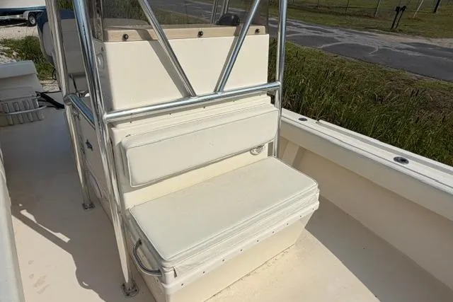 Slide: The Image of 2007 Parker 23 SE boat interior with cushioned seating and stainless steel frame. - 5