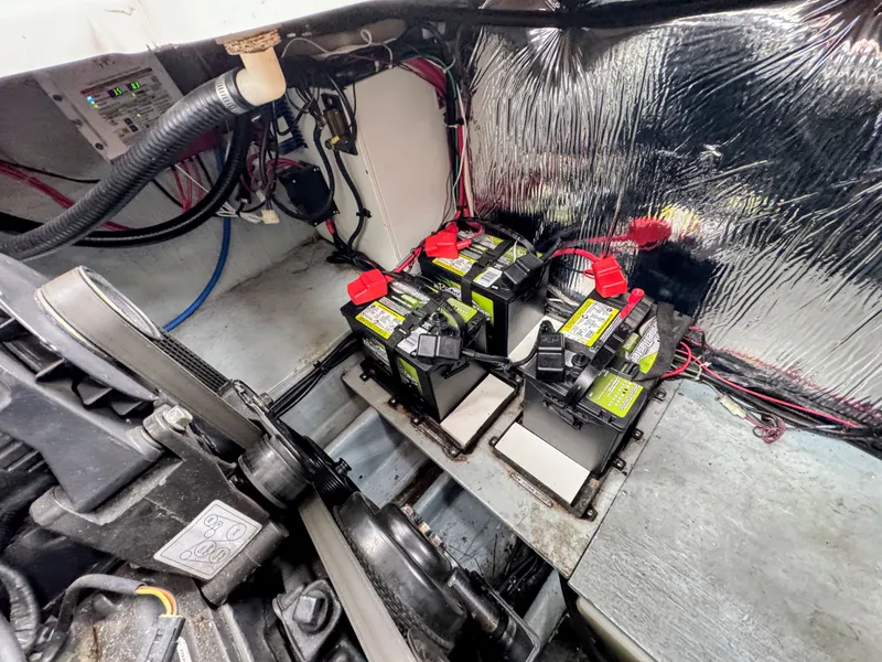 Slide: The Image of Batteries in the engine compartment of a 2001 Four Winns 298 Vista. - 31