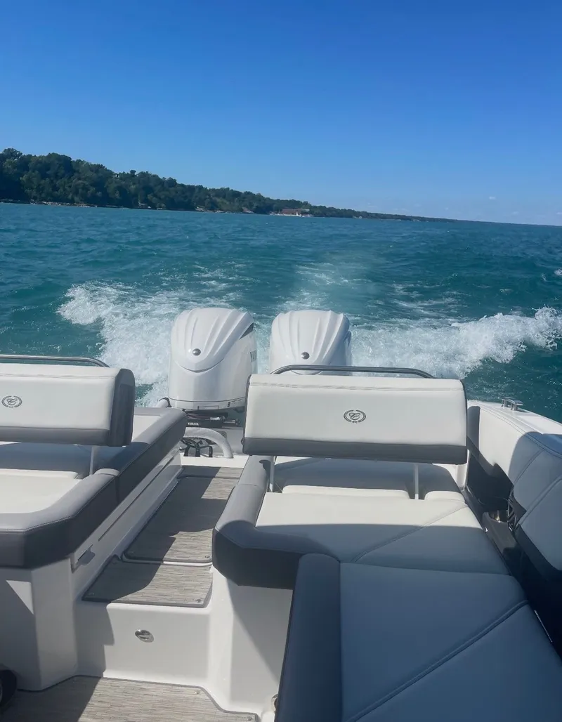 Slide: The Image of The image shows the stern of a Cobalt R8 boat on the water. - 6