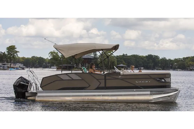 Slide: The Image of Manufacturer Provided Image: 2021 Crest Caribbean LX 250 SLS pontoon boat on a lake with canopy. - 3