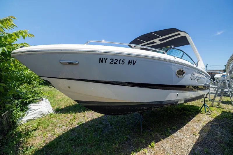 The Image of 2025 Chaparral 250 OSX boat on land, sunny day, registration NY 2215 MV. - 0