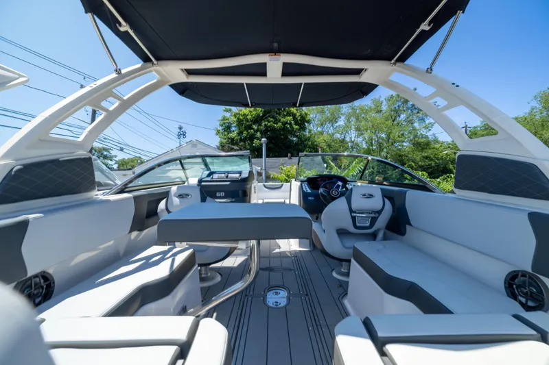 Slide: The Image of Interior view of 2025 Chaparral 250 OSX boat, featuring sleek seating and modern design. - 4