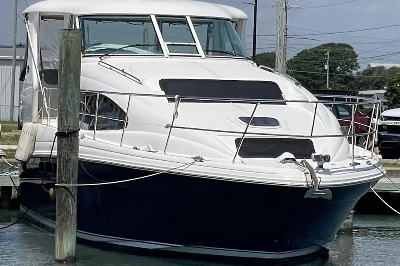 The Image of 2006 Sea Ray 40 Motor Yacht docked at marina, front view. - 0
