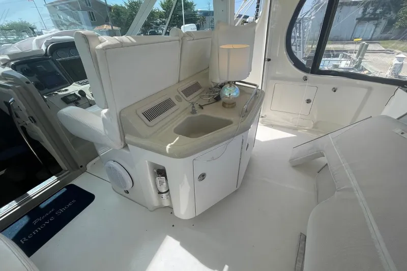 Slide: The Image of 2006 Sea Ray 40 Motor Yacht interior with sink, lamp, and control panel. - 17