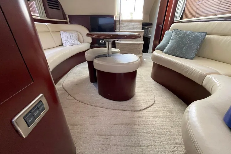 Slide: The Image of Luxurious interior of a 2006 Sea Ray 40 Motor Yacht with plush seating and elegant decor. - 49