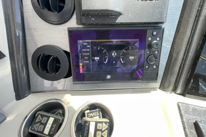 Slide: The Image of Control panel of a 2006 Sea Ray 40 Motor Yacht displaying engine metrics. - 59