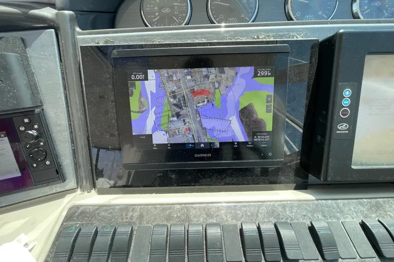 Slide: The Image of Garmin navigation display on 2006 Sea Ray 40 Motor Yacht dashboard. - 64