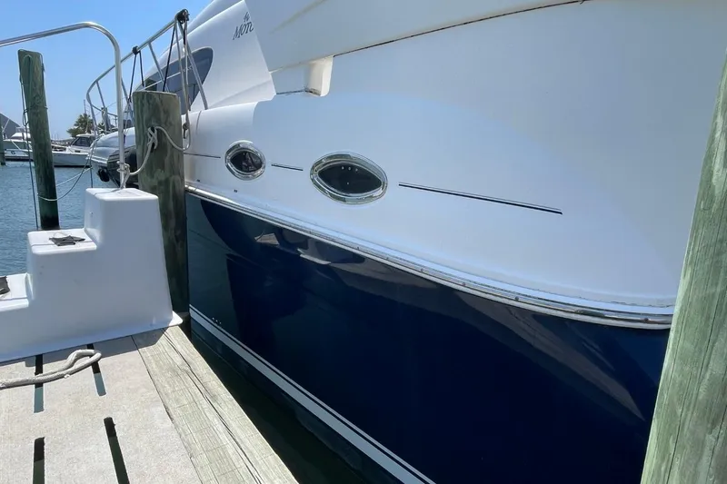 Slide: The Image of 2006 Sea Ray 40 Motor Yacht docked at marina, side view. - 68