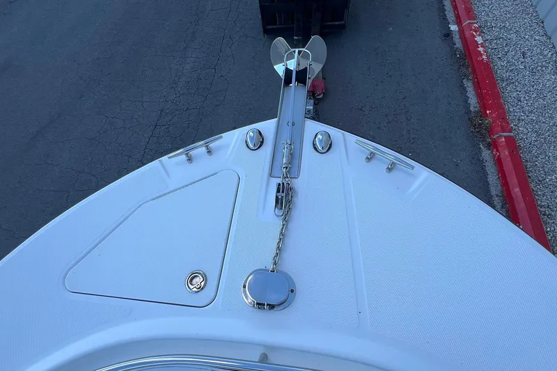 Slide: The Image of Bow view of 2006 Edgewater 245CC boat with anchor and chain. - 10