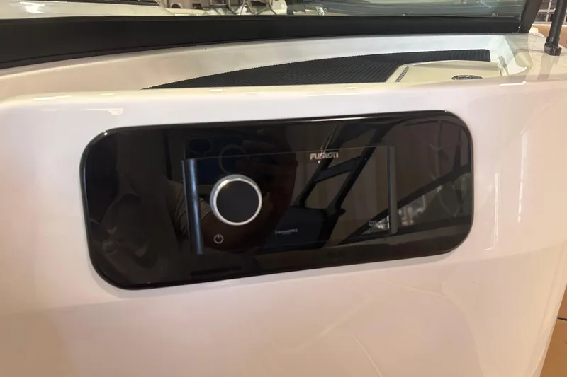Slide: The Image of Fusion stereo system on 2026 Sea Ray SDX 250 Surf boat dashboard. - 10