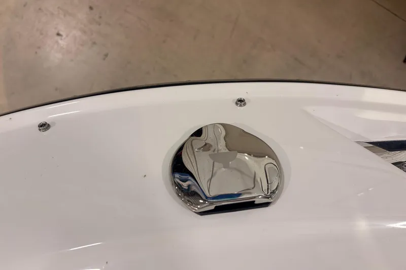 Slide: The Image of 2026 Sea Ray SDX 250 Surf boat detail with chrome fixture. - 12