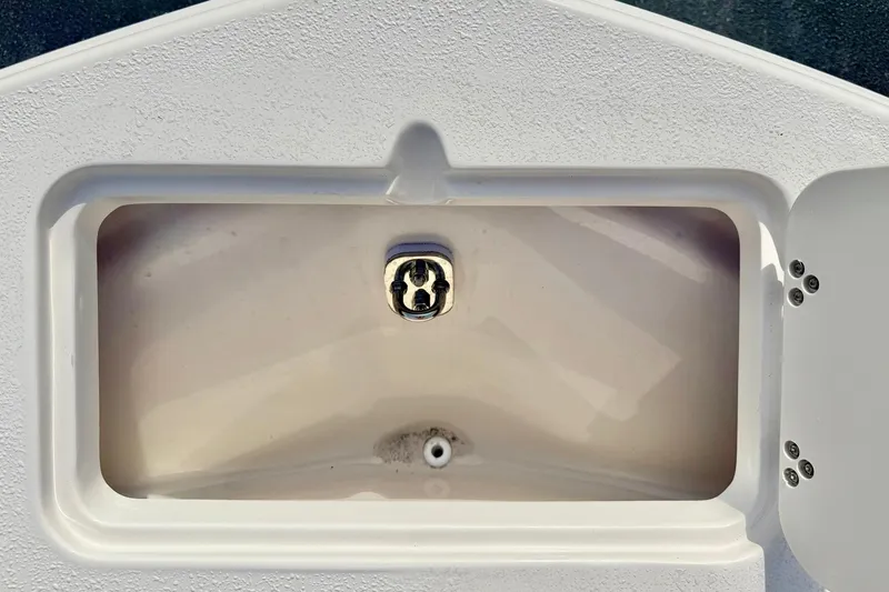 Slide: The Image of Livewell compartment on a 2026 Carolina Skiff 24 Ultra Elite boat. - 14