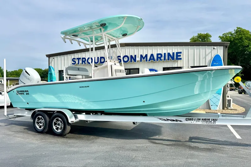 Slide: The Image of 2026 Carolina Skiff 24 Ultra Elite boat on trailer at Stroud & Son Marine. - 6