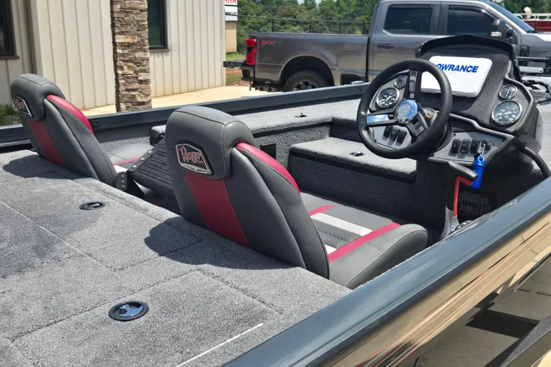 Slide: The Image of 2023 Ranger RT178 boat interior with dual seats and steering console. - 11