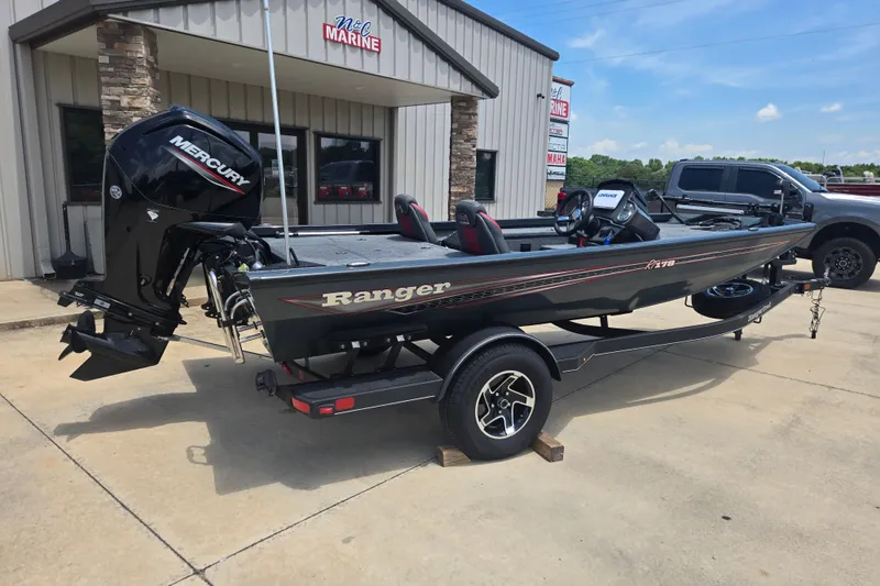 Slide: The Image of 2023 Ranger RT178 boat with Mercury engine on trailer outside dealership. - 6