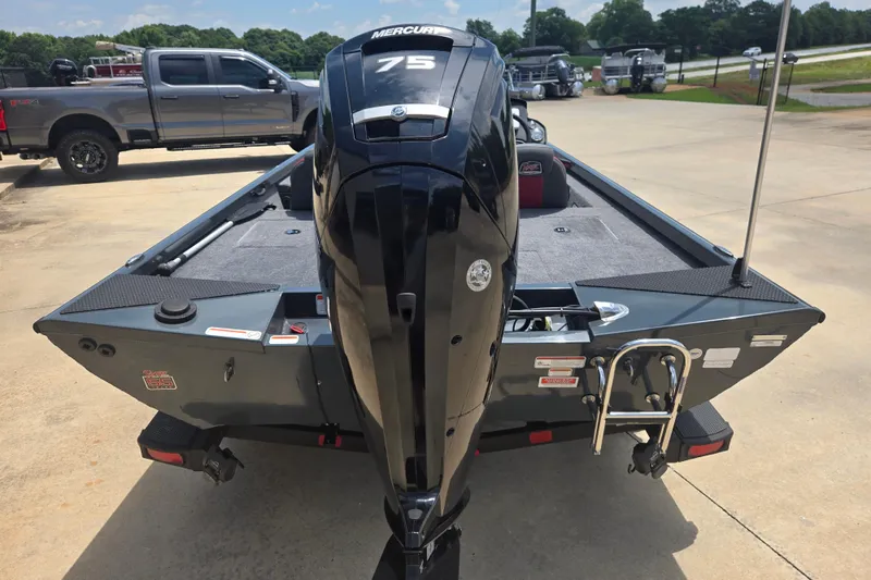 Slide: The Image of 2023 Ranger RT178 boat with Mercury 75 engine, parked outdoors on concrete. - 8