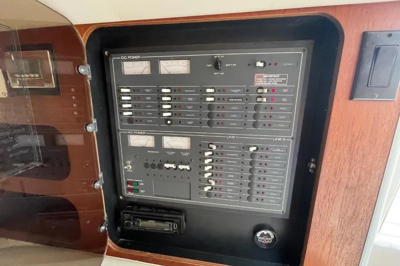 Slide: The Image of Electrical control panel on a 1997 Tiara Yachts 3100 Open boat. - 25