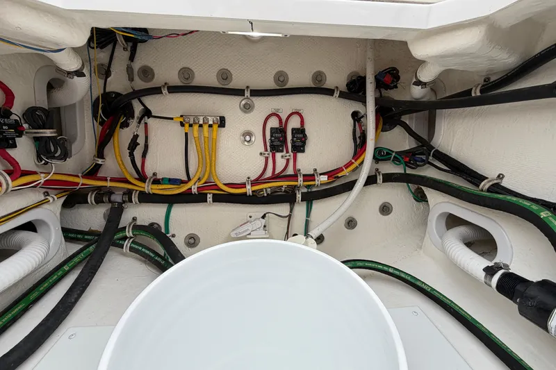 Slide: The Image of Electrical wiring and components inside a 2024 Albemarle 30 Express boat. - 20
