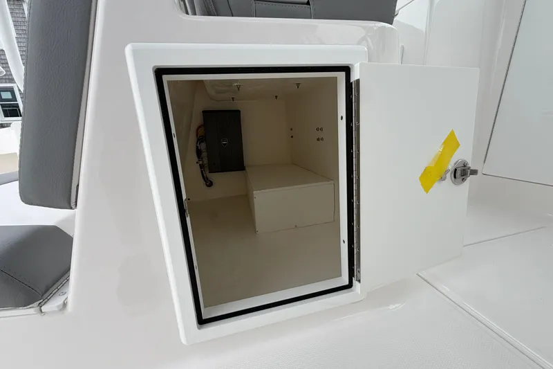 Slide: The Image of Open storage compartment on 2024 Albemarle 30 Express boat, showcasing interior space. - 33