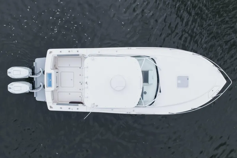 Slide: The Image of Overhead view of 2024 Albemarle 30 Express boat on water. - 13