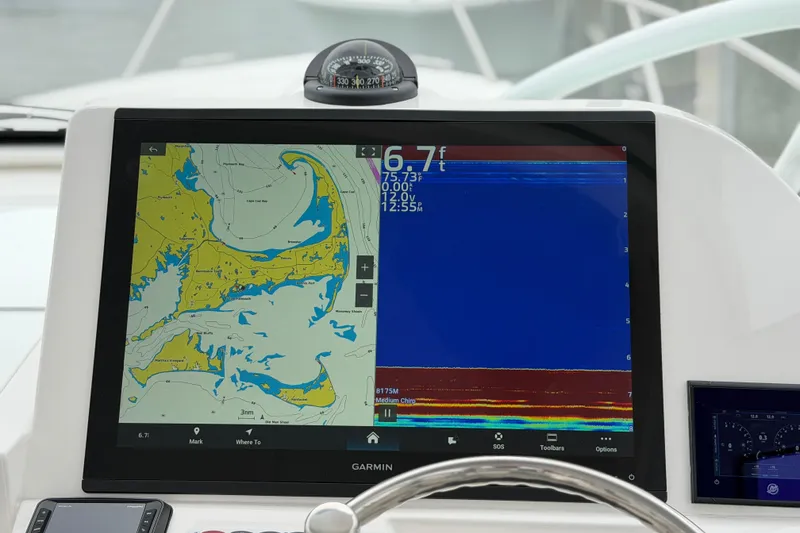 Slide: The Image of 2024 Albemarle 30 Express boat navigation display with map and sonar readings. - 45