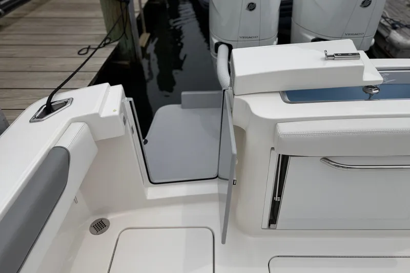 Slide: The Image of 2024 Albemarle 30 Express boat deck with seating and storage compartments. - 18