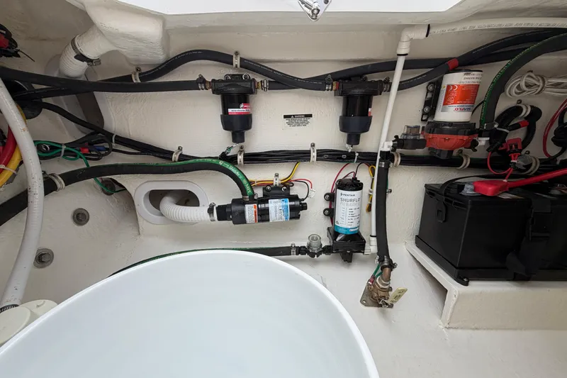 Slide: The Image of Engine compartment of 2024 Albemarle 30 Express boat, showcasing wiring and components. - 22