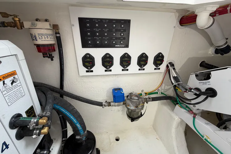 Slide: The Image of Electrical panel and components in 2024 Albemarle 30 Express boat engine room. - 41