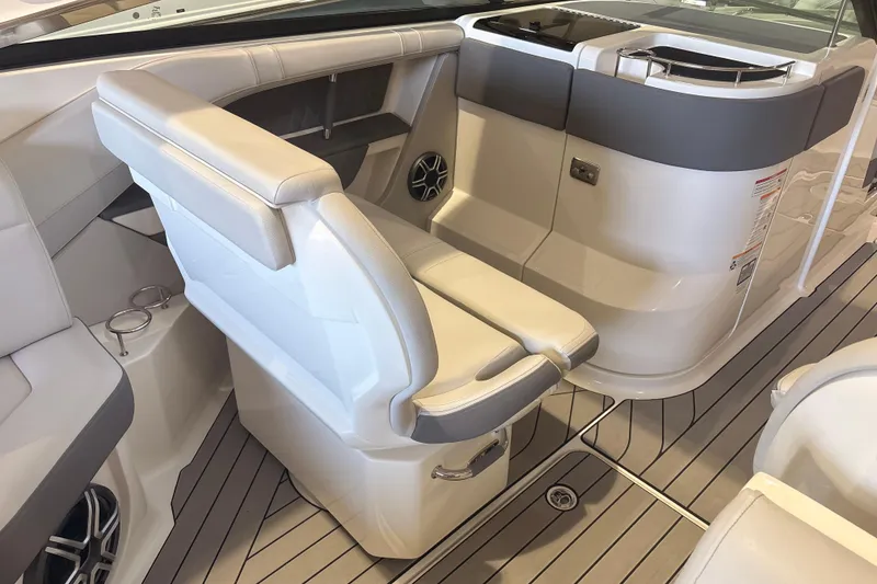 Slide: The Image of Luxurious interior of 2026 Sea Ray SLX 310 Outboard boat with sleek seating and modern design. - 13