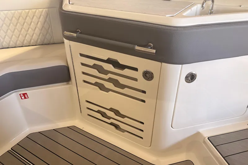 Slide: The Image of Interior view of 2026 Sea Ray SLX 310 Outboard, featuring sleek seating and modern design. - 17