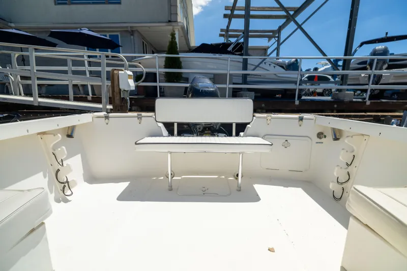 Slide: The Image of Interior view of a 2012 KEYWEST 2020 WA boat, featuring seating and storage compartments. - 7