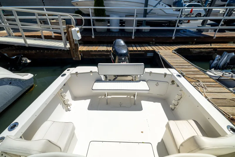 Slide: The Image of Open deck of a 2012 KEYWEST 2020 WA boat docked at a marina. - 8