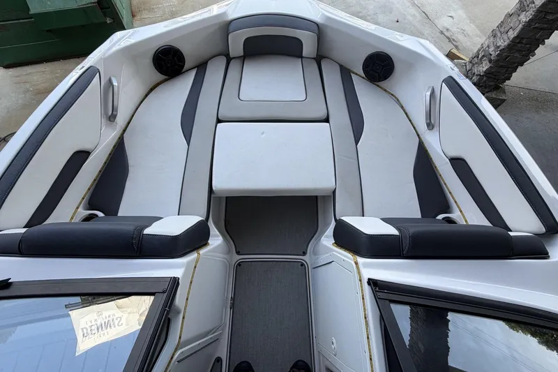 Slide: The Image of 2022 Yamaha Boats AR195 interior with sleek seating and modern design. - 6