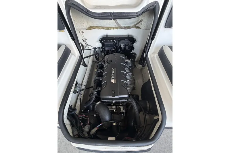Slide: The Image of 2022 Yamaha Boats AR195 engine compartment showcasing powerful motor design. - 9