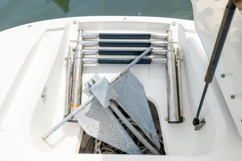 Slide: The Image of Anchor and ladder storage on 2011 Sea Ray 220 Sundeck boat. - 8