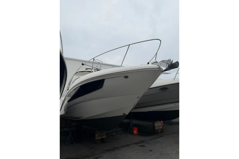 Slide: The Image of 2016 Sea Ray Sundancer 330 boat on stands, viewed from the front. - 34