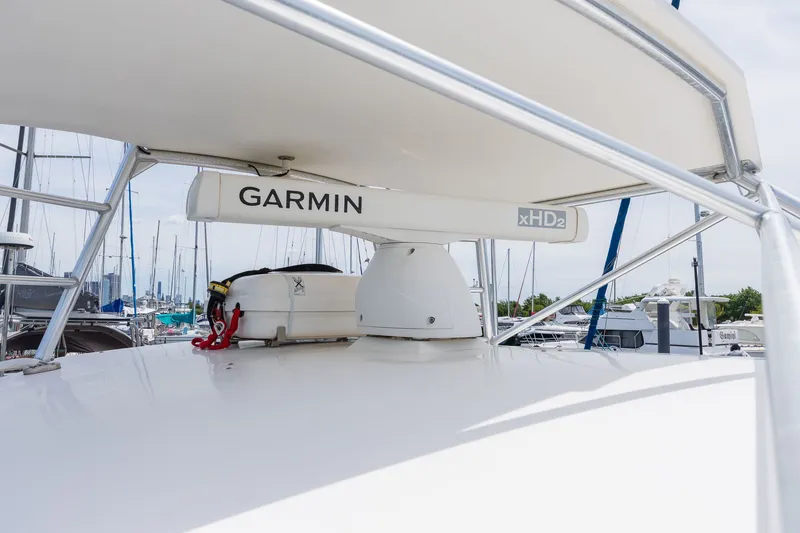 Slide: The Image of A Garmin xHD2 radar on a boat's roof in a marina. - 29