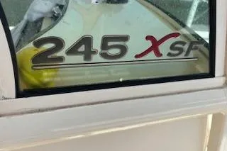 Slide: The Image of Scout 245 XSF boat window decal, 2014 model, close-up view. - 7